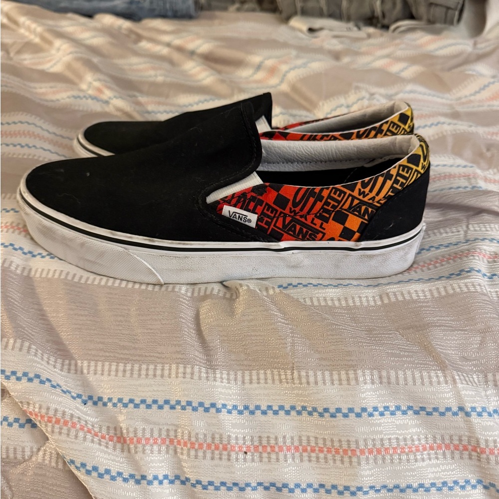 Vans Black Slip-On Shoes with Orange and Yellow Accents